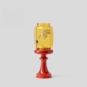 Chinese-inspired red glass and ceramic candle holder for tealights