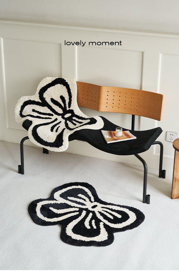 Black and white bowknot area rug with soft tufted texture