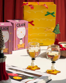 Snowman wine glass with amber star-shaped foot and golden star details