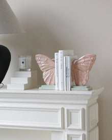 Butterfly resin bookend decor with sculptural wing design