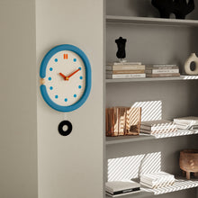 Vintage blue wooden wall clock with pendulum for home decor