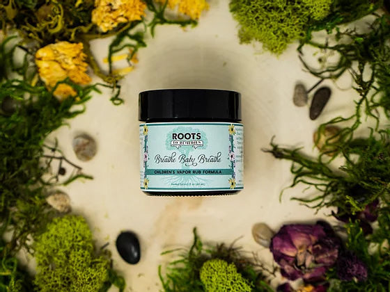 Children’s vapor rub salve in a 2 oz amber jar