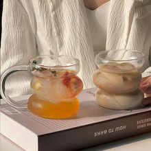 Round glass coffee cup with handle for coffee or tea