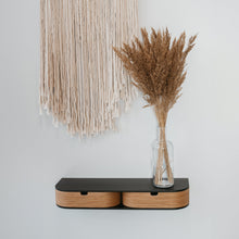 Wall-mounted floating shelf with two drawers in a minimalist wood finish