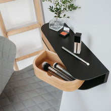 Wall-mounted floating shelf with two drawers in a minimalist wood finish