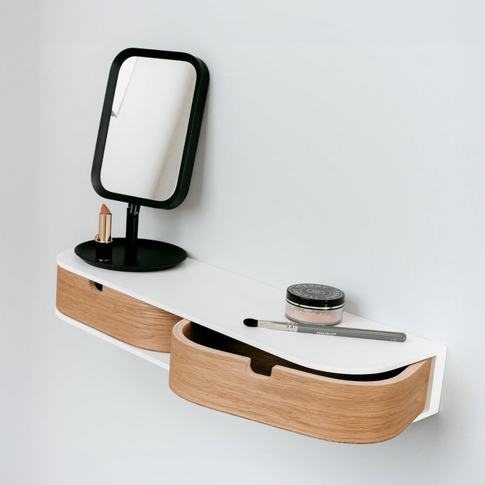 Wall-mounted floating shelf with two drawers in a minimalist wood finish