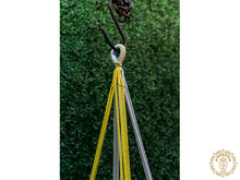 Yellow macramé baby hammock chair handwoven from cotton