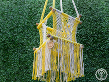 Yellow macramé baby hammock chair handwoven from cotton
