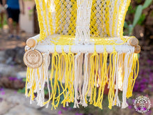 Yellow macramé baby hammock chair handwoven from cotton