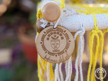 Yellow macramé baby hammock chair handwoven from cotton
