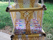 Yellow macramé baby hammock chair handwoven from cotton