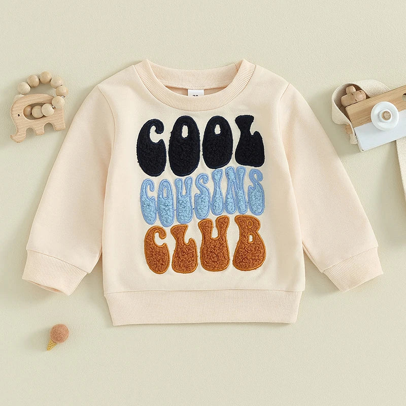 Bézs gyerek pulóver Cool Cousins Club felirattal