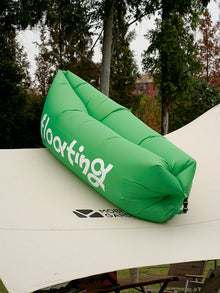Inflatable outdoor lounger sofa for portable seating at the beach, campsite or garden
