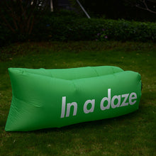 Inflatable outdoor lounger sofa for portable seating at the beach, campsite or garden