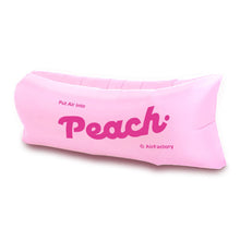 Inflatable outdoor lounger sofa for portable seating at the beach, campsite or garden
