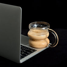 Round glass coffee cup with handle for coffee or tea