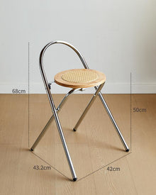 French-inspired walnut rattan folding stool with woven seat