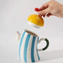 Ceramic waist-handle teapot for serving tea and cold drinks