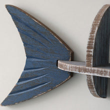 Fish-shaped wall shelf with multi-level display storage
