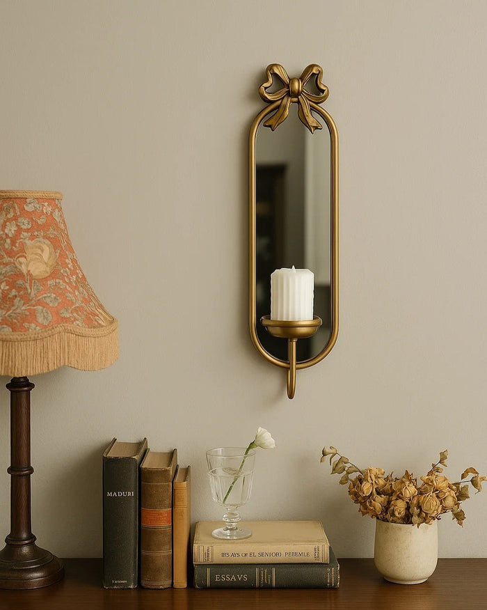 Vintage iron wall mirror with built-in candle holder