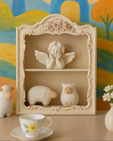 Retro French brown resin wall storage shelf with carved decorative detailing