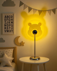 Heart and moon LED projector table lamp with warm ambient light