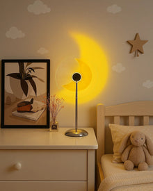 Heart and moon LED projector table lamp with warm ambient light