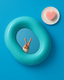 Hot pink donut-shaped makeup mirror for vanity or dressing table