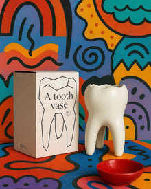Tooth-shaped ceramic vase for quirky home decor
