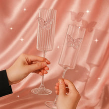Set of two butterfly wine glasses with one striped glass and one smooth glass