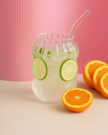 Clear glass coffee cup with matching straw for iced drinks