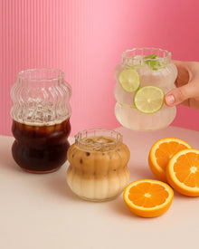 Clear glass coffee cup with matching straw for iced drinks