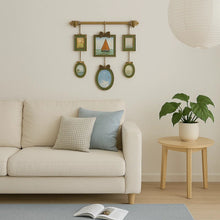 Vintage multi-frame hanging wall art with green and gold frames and landscape artwork