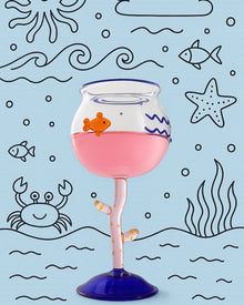 Ocean-inspired wine glass with fish motif and coral-style stem