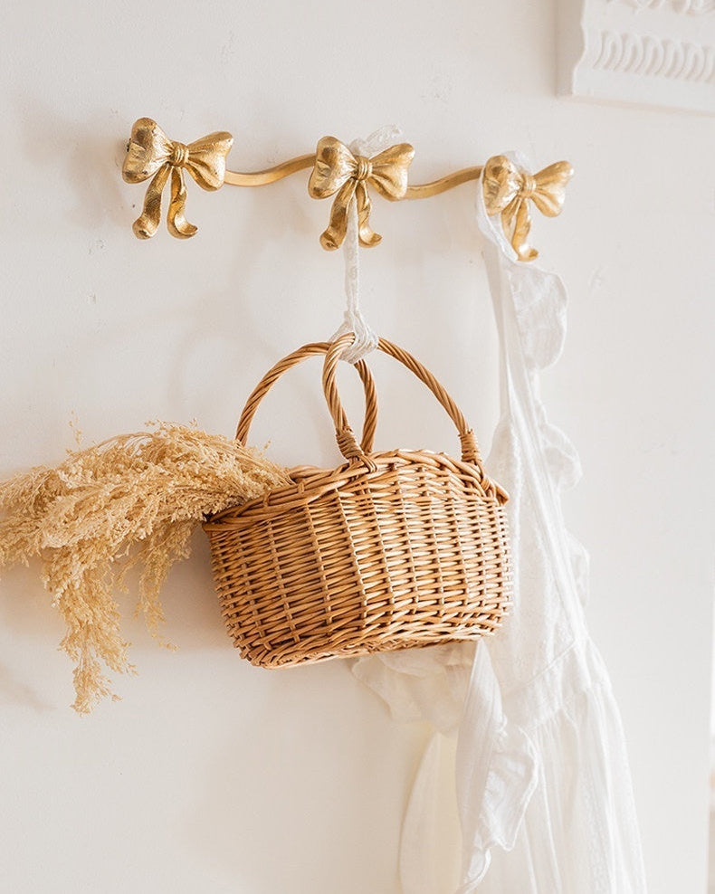 Vintage bow triple wall hook with antique-style finish
