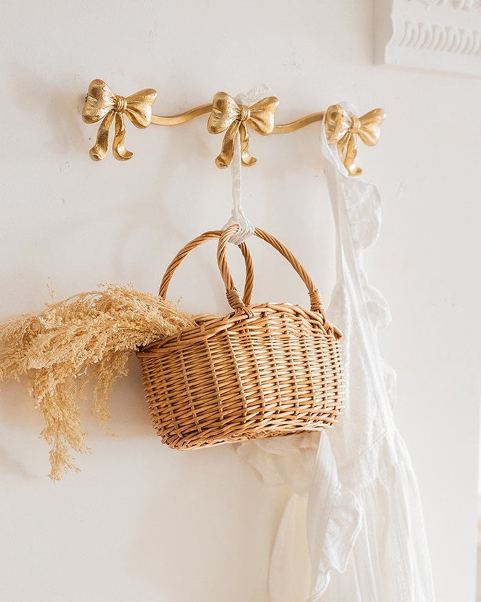 Vintage bow triple wall hook with antique-style finish