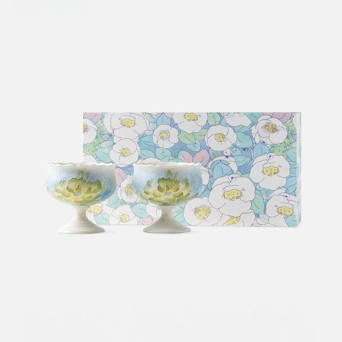 Set of two ceramic lotus tea cups with hand-painted floral design