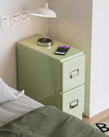 Matcha green narrow bedside cabinet with two drawers and metallic handles