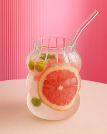 Clear glass coffee cup with matching straw for iced drinks