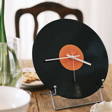 Black vinyl record-inspired clock with stand for wall or tabletop display