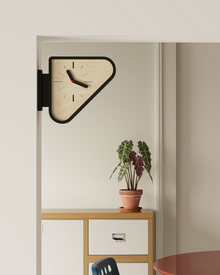 Triangle corner wall clock with double-sided geometric design