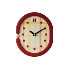 Red grid wall clock with pendulum and retro dot hour markers