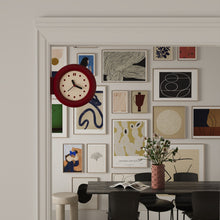 Double-sided round wall clock with bracket-mounted retro design