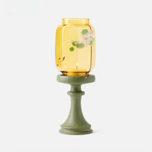 Chinese-inspired red glass and ceramic candle holder for tealights
