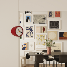 Red corner clock with dot dial for decorative home styling