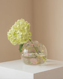 Transparent glass flower vase with delicate wildflower detail