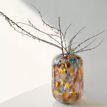 Colorful polka dot glass vase with cylindrical shape