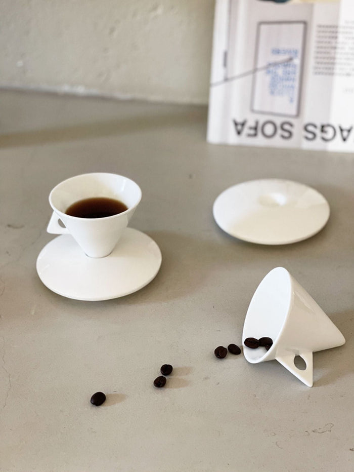 Triangular ceramic espresso cup with matching saucer