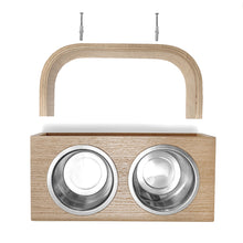 Wall-mounted oak wooden dog feeding station with two stainless steel bowls