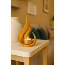 Dune Flamora gold LED ambient light with flame-shaped holder